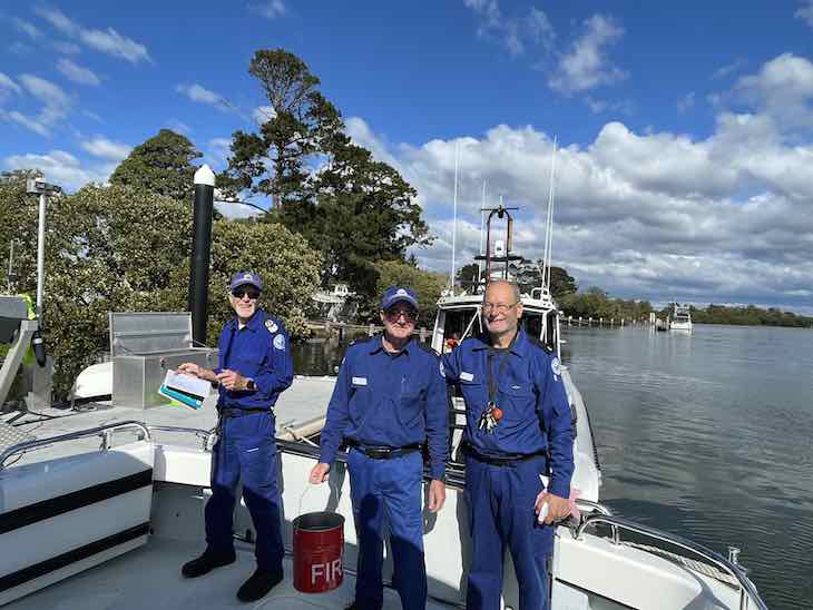 Mike, Trevor and Kit doing weekly chores on the boats